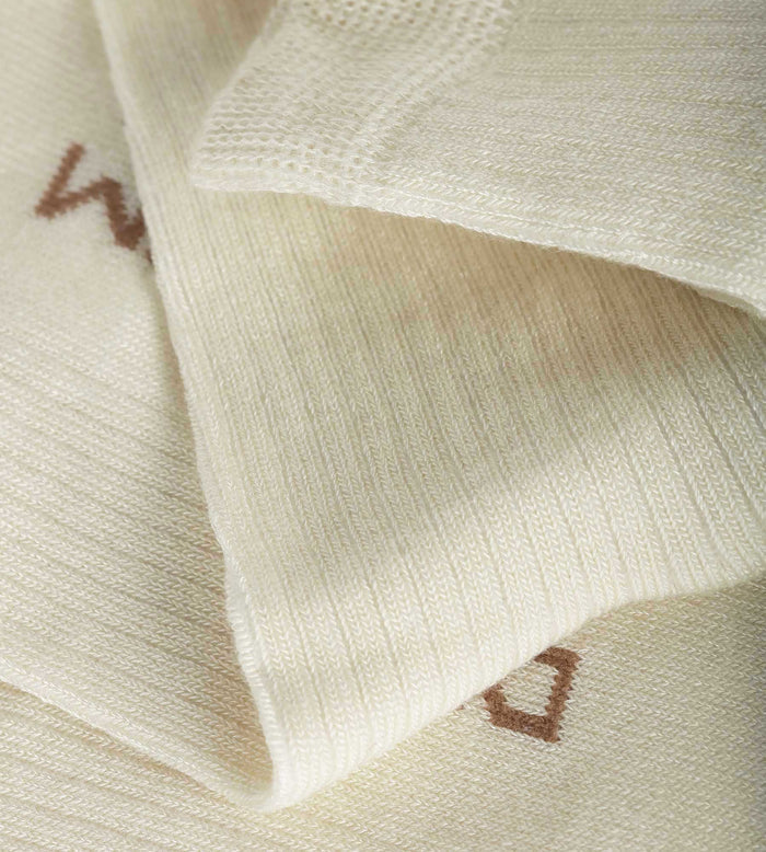 Chaussettes haute côtelée en coton Ivoire Dim Modal