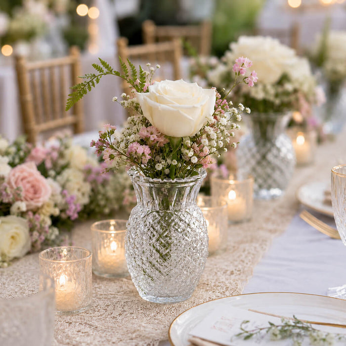 Clear Pineapple Glass Bud Vase with a white rose on a romantic wedding table