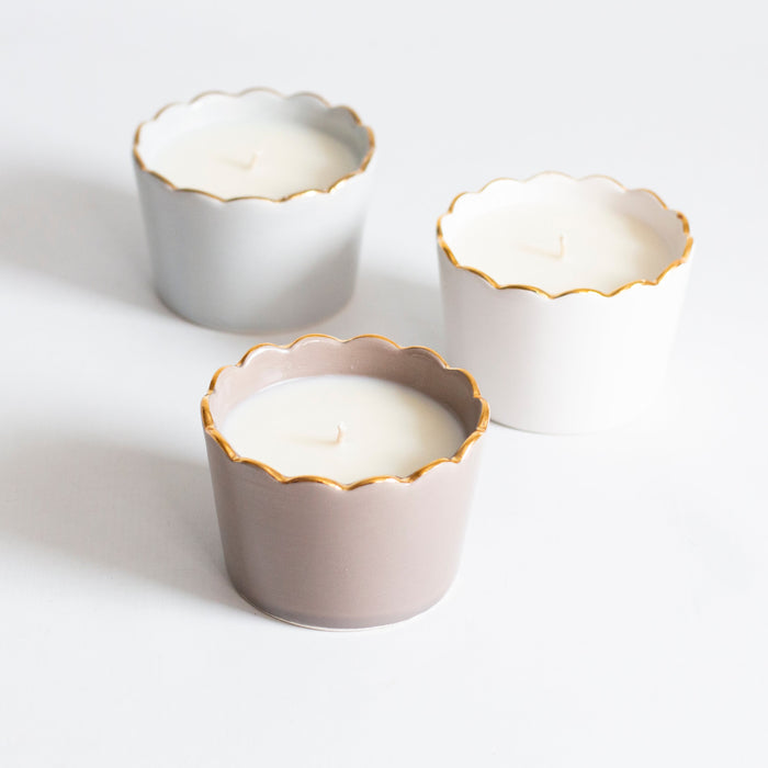 Scallop Soy Candle Cup in Gold-Luster Stoneware — candle cups with alternate neutral colors shown for reference; Susan Gordon Pottery