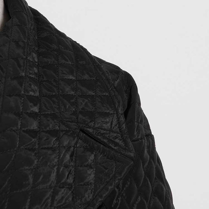 Stylish oversized black winter jacket for women with a quilted design and a sleek collar