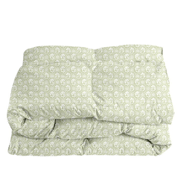Sophie in Celadon Reverse Comforter — folded pale green comforter mockup with a geometric botanical repeat; Wheaton Whaley Home
