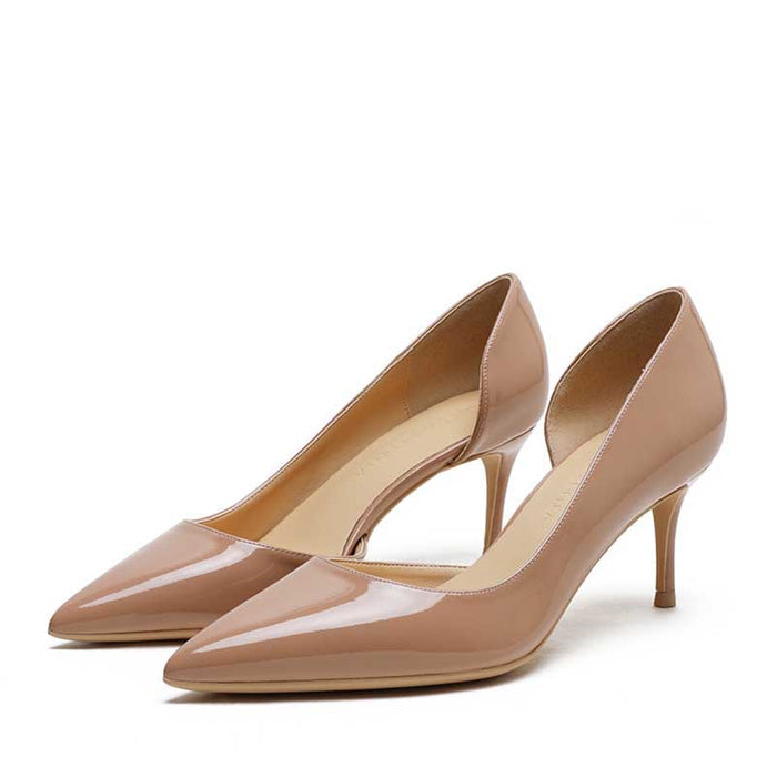 Elegant women's patent leather party heels in nude with pointed toes and slim heels for stylish events