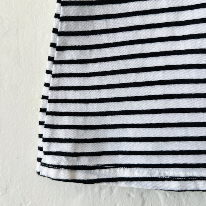 Close-up of a black and white striped fabric on a light background
