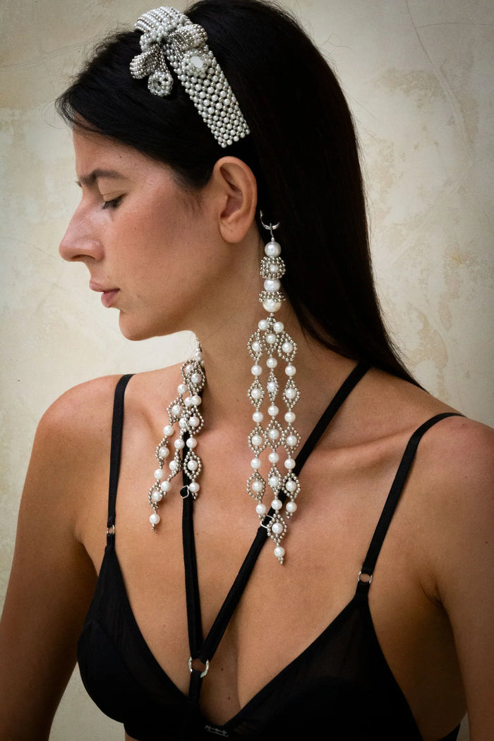 woman in black outfit wear handcrafted beaded modular headband with trinity medallion by object and dawn