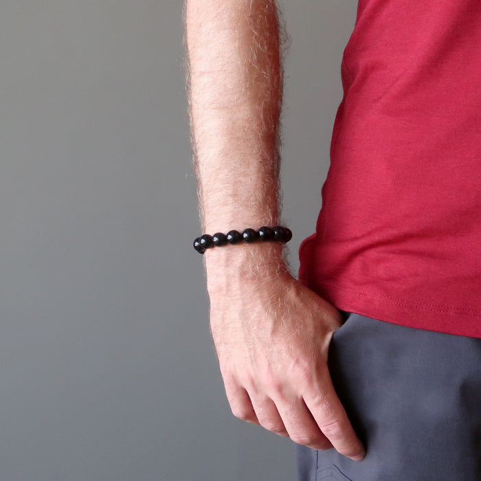 male model wearing Black Obsidian Bracelet with hand in pocket