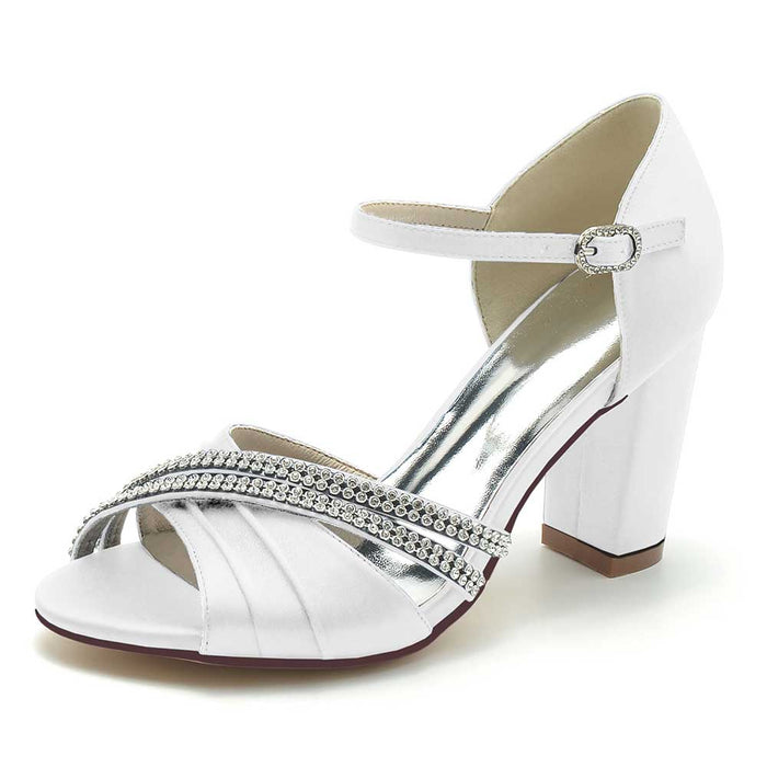 Elegant white block heel wedding sandals with rhinestone embellishments and ankle strap for brides