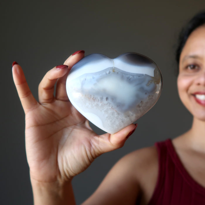 female model holding Blue Lace Agate Heart