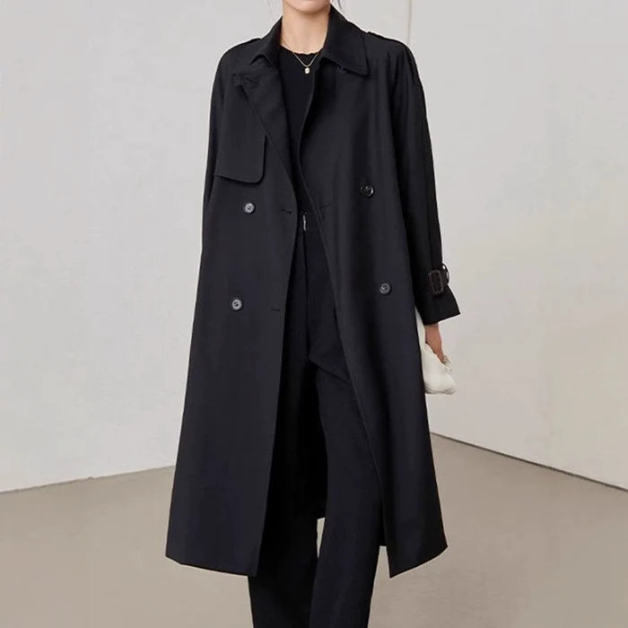 Stylish black British style trench coat for women with a relaxed fit and dual buttons