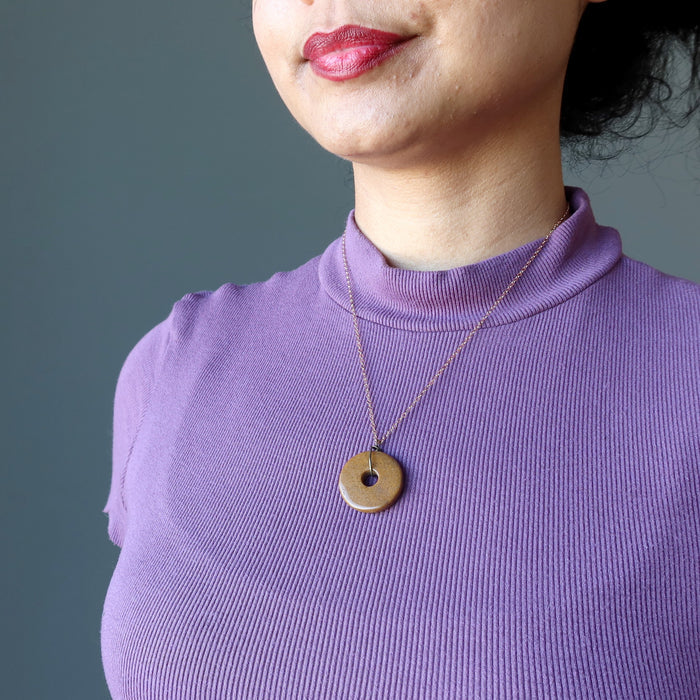 sheila of satin crystals wearing Brown Jasper Donut Amulet on 14k Rose Gold necklace