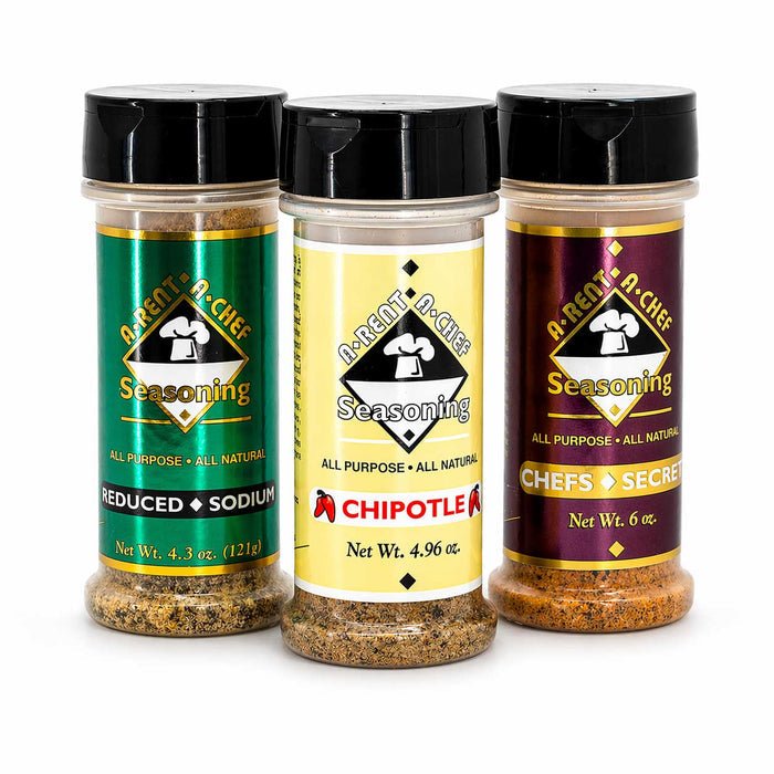 Three seasoning bottles with different labels on a white background