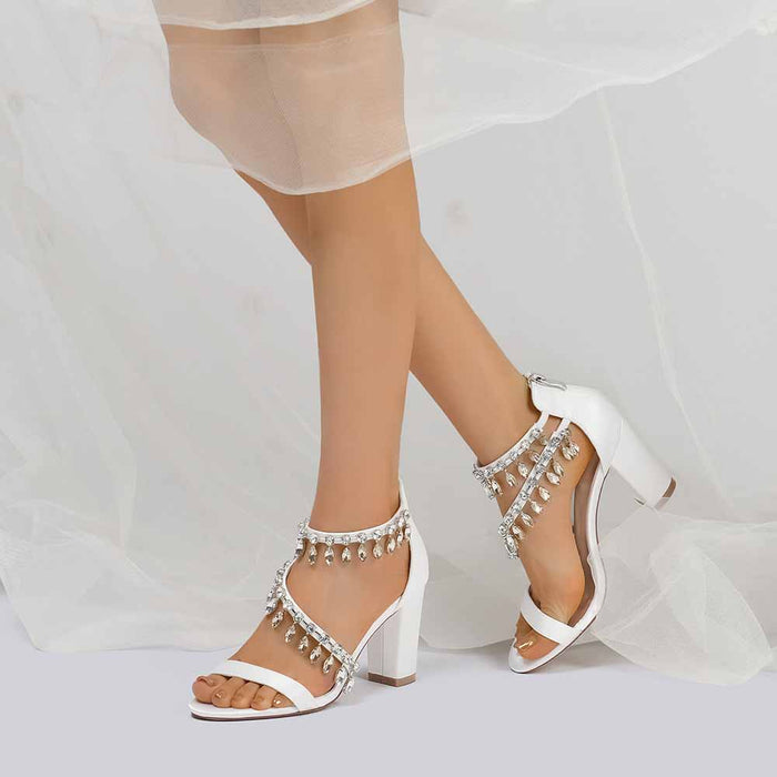 Elegant white chunky heel prom shoes with decorative bead accents for special occasions