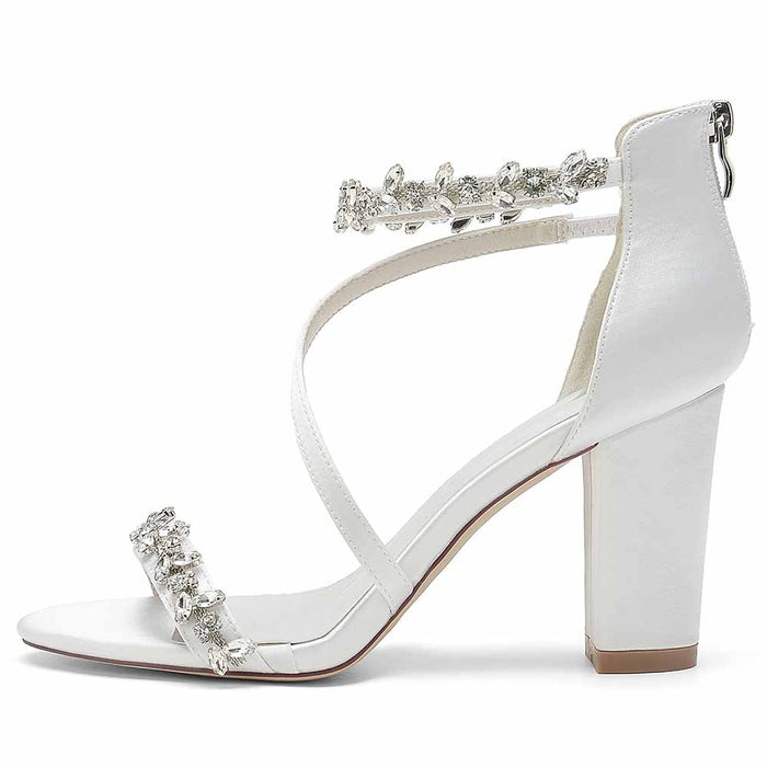 Elegant S&DCo. chunky heel sandals for event with decorative rhinestone straps