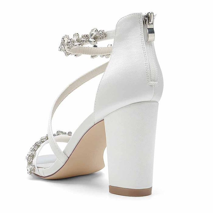 Elegant S&DCo. white chunky heel sandals for event with embellished straps and zipper back