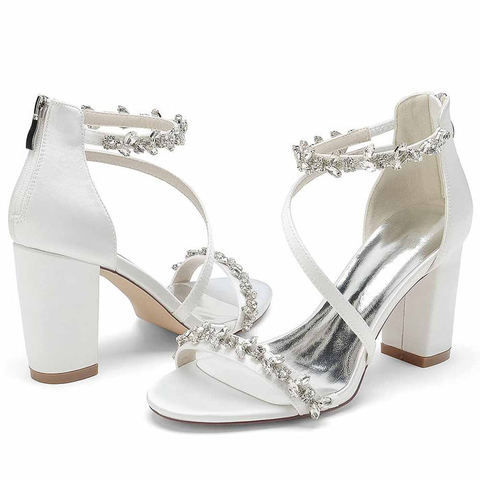 Stylish S&DCo. chunky heel sandals for event with embellished ankle straps in white