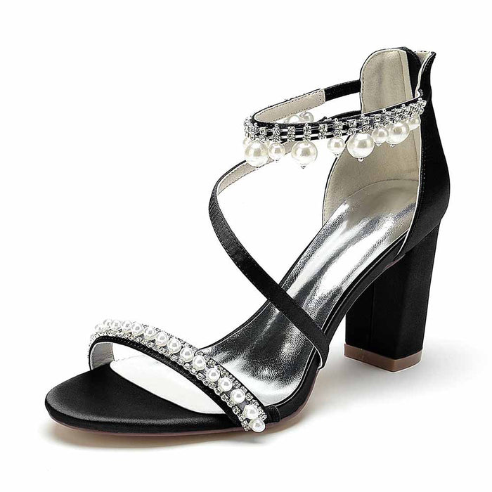 Elegant S&DCo. black heels with pearl accents, perfect shoes for wedding celebrations