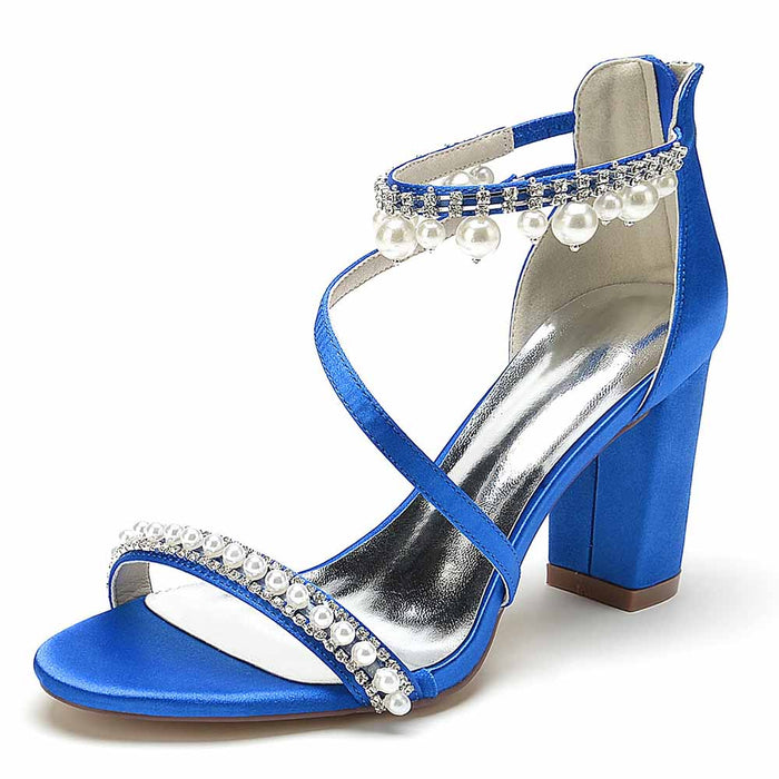 Elegant blue heels with pearl detailing, perfect shoes for wedding celebrations