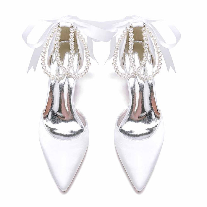 Elegant closed toe wedding shoes by S&DCo featuring pearl embellishments and ribbon detail