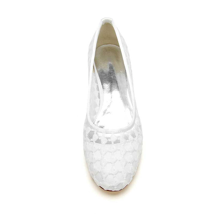 Elegant white comfortable bridal flats with a sleek design for the perfect wedding day footwear