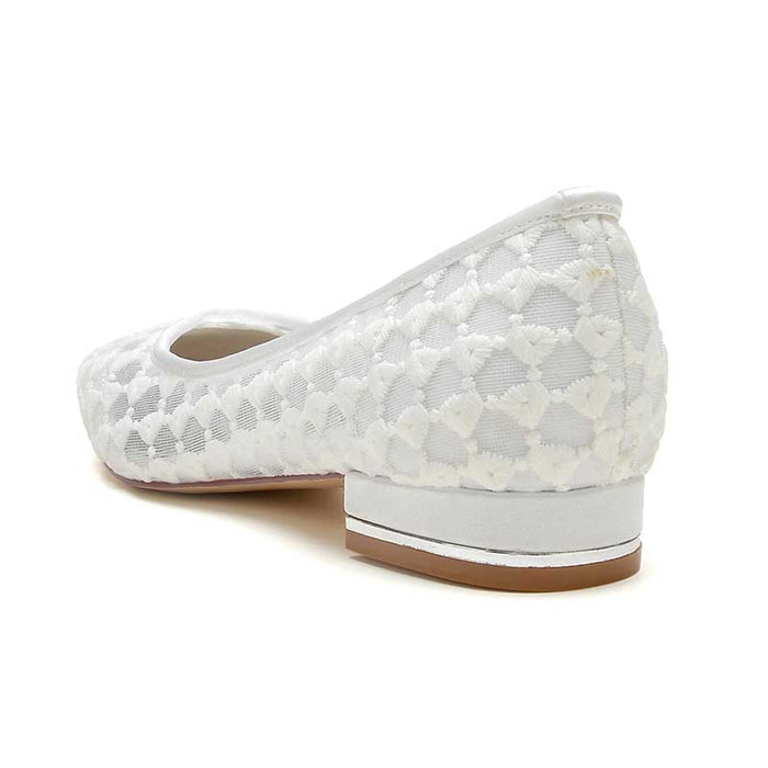 Elegant white comfortable bridal flats with a textured design and low heel for all-day comfort