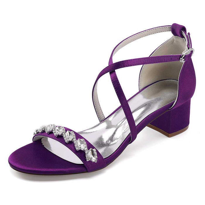 Purple crystal chunky heel dress sandals with strappy design and embellishments for elegant occasions