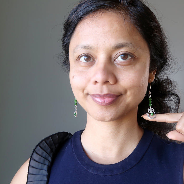 sheila of satin crystals wearing sterling silver cat and green diopside gemstone earrings