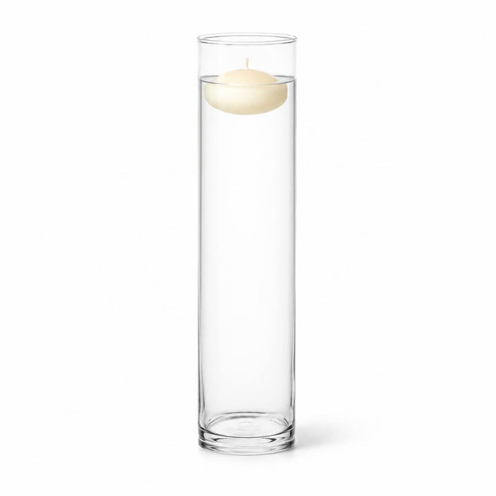 A 4"x17" clear glass cylinder vase containing a floating candle