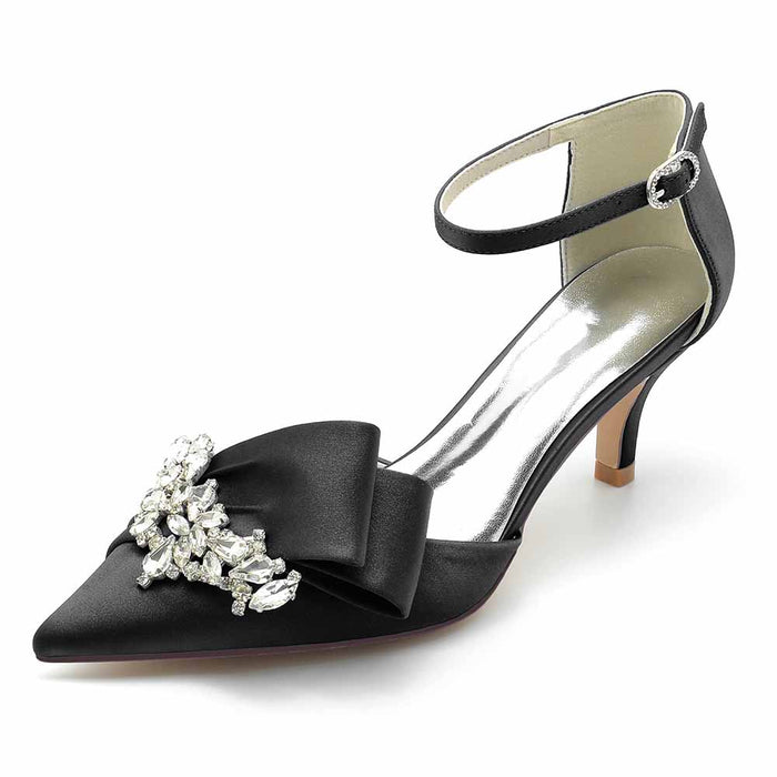 Elegant black TC bridal shoes for the bride featuring a bow and jeweled embellishments