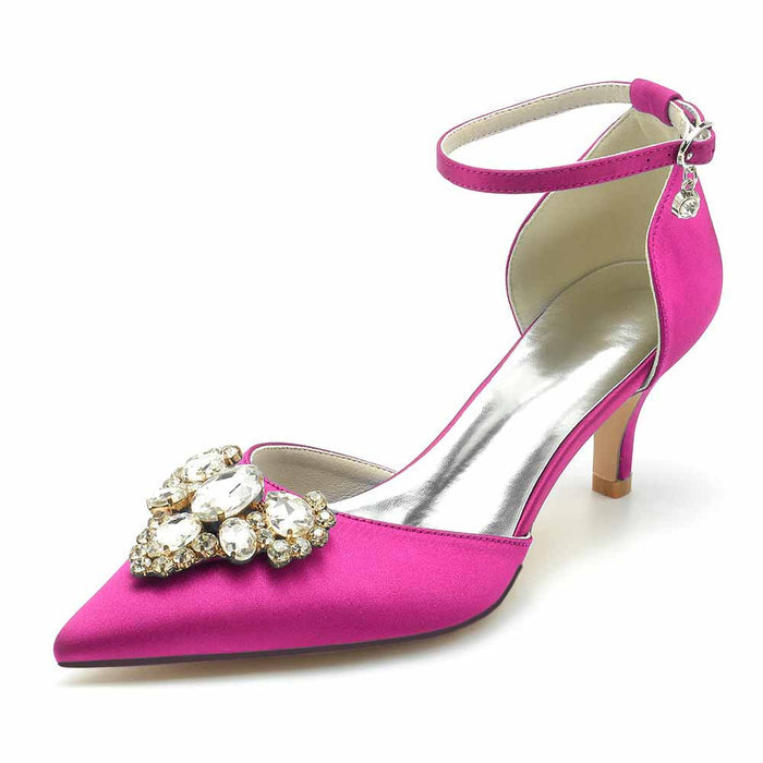 Elegant pink satin heels for a wedding with a decorative rhinestone embellishment