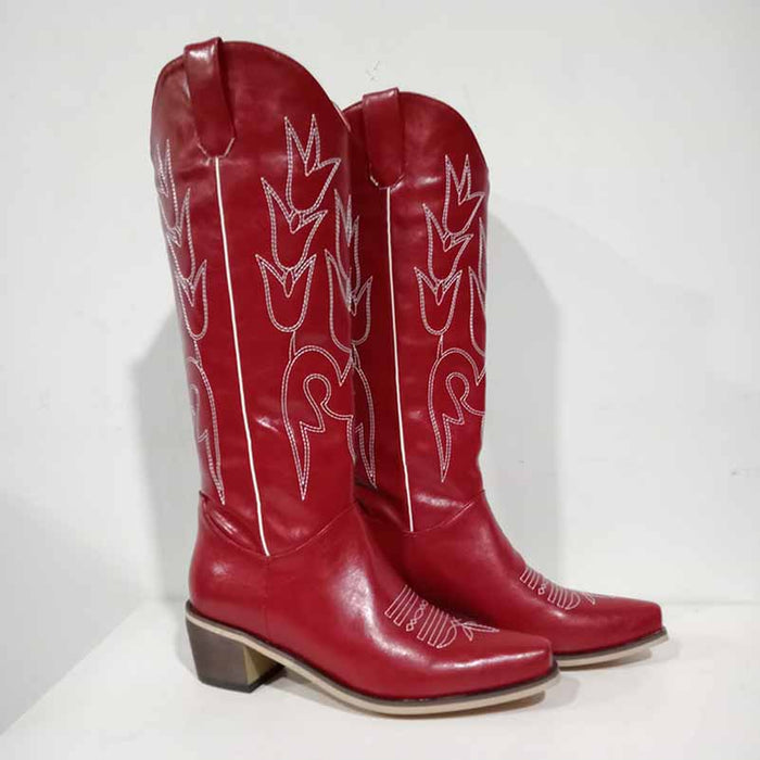 Red women's western embroidered boots featuring intricate floral designs and a stylish heel
