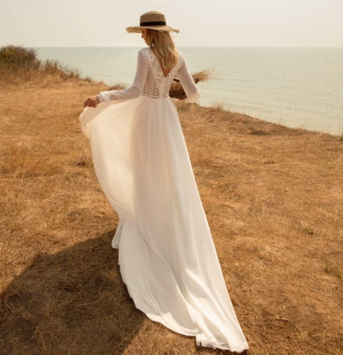 Ethereal Long-Sleeve Lace Wedding Dress with V-Neck & Flowing Tulle Skirt