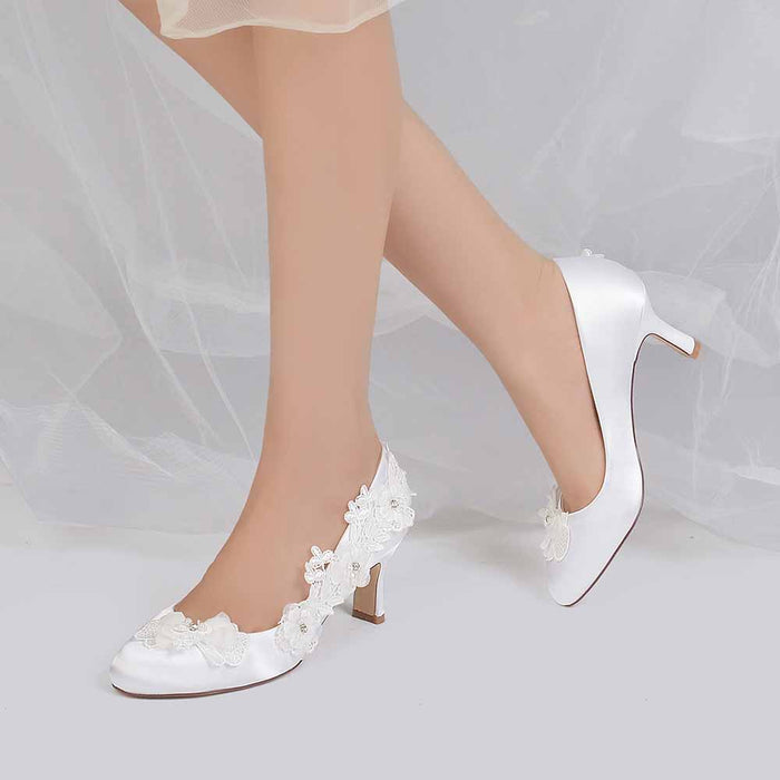 Elegant white flower lace bridal shoes by sdhk. with delicate floral detailing for special occasions