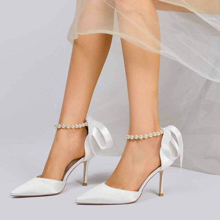 Elegant S&DCo. white heels with pearl ankle straps perfect as shoes for the wedding