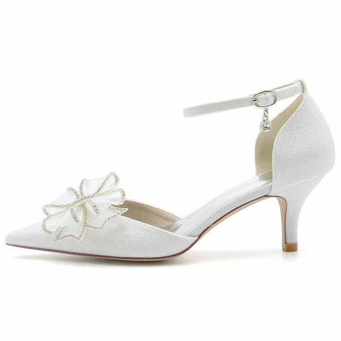 Elegant glitter bridal shoes low heel with decorative flower for a stylish wedding look