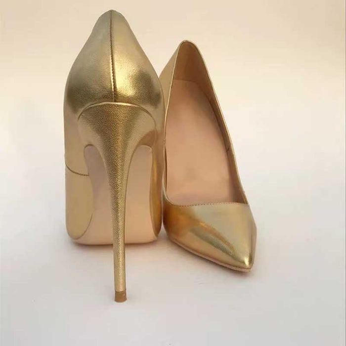 Elegant gold heel pumps for women with a sleek pointed toe design and high stiletto heel.
