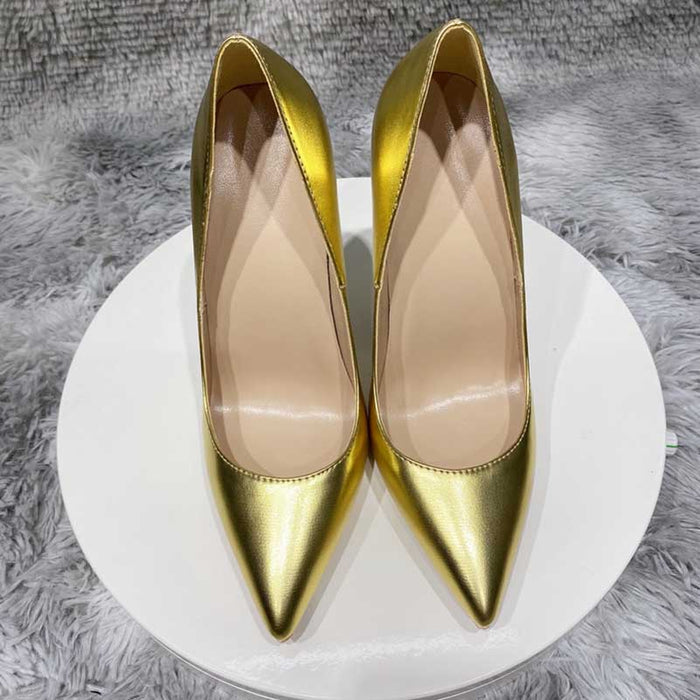 Shiny gold heel pumps for women with a sleek pointed toe design by SD Dresscode & Fashiontrends