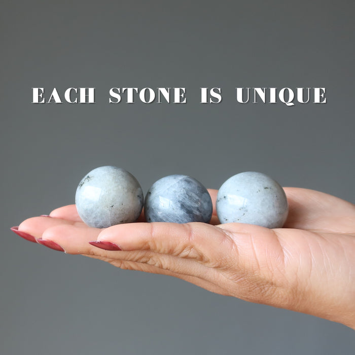 labradorite spheres in palm