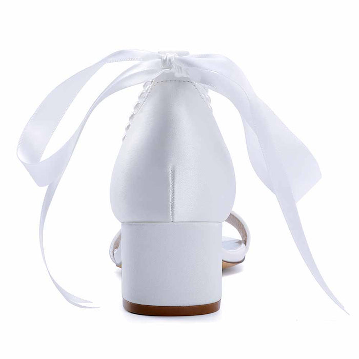 Elegant white lace up chunky heel dress shoes with satin finish and stylish back ribbons