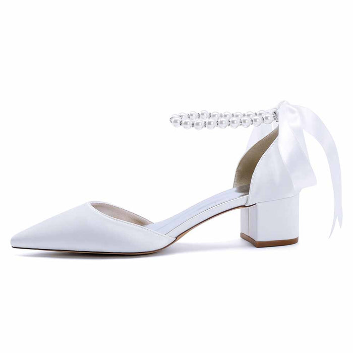 Elegant white lace-up dress sandals for brides with pearl detail and a chic ribbon tie