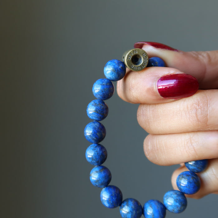 win 9mm luger bullet inscription beaded on a lapis stretch bracelet