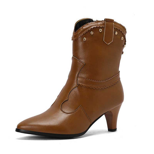 A brown, low heel western ankle boot with a kitten heel and decorative stitching on the upper.