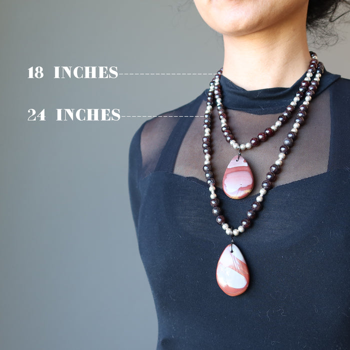 female wearing mookaite jasper and red garnet beaded necklaces showing 18 inches and 24 inches