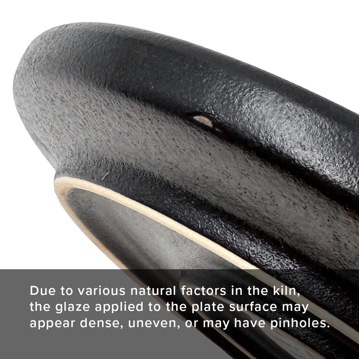 Due to various natural factors in the kiln, the glaze applied to the plate surface may appear dense, uneven, or may have pinholes.