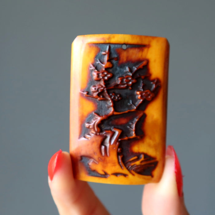 ox bone cherry blossom pendant