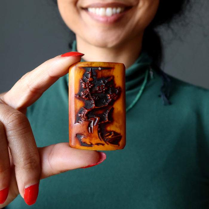 ox bone cherry blossom pendant