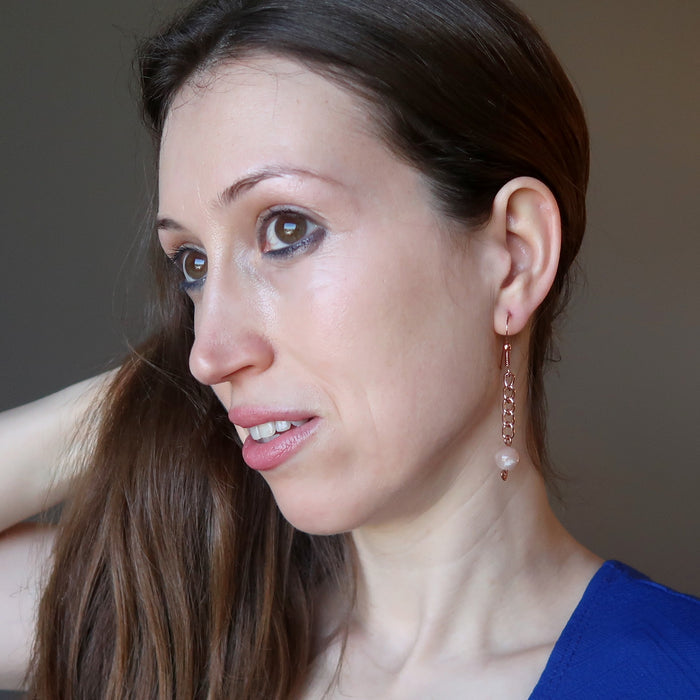 holly of satin crystals wearing pink moonstone copper chain earrings