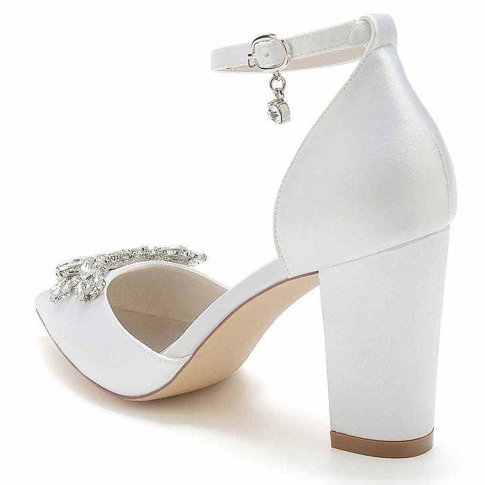 Elegant pearl embellished satin high heels with a sleek ankle strap and decorative detailing