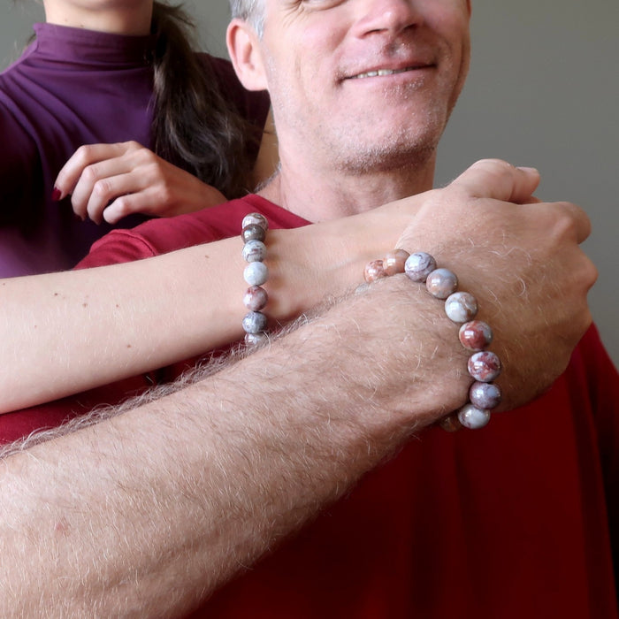 couple wearing pietersite bracelets