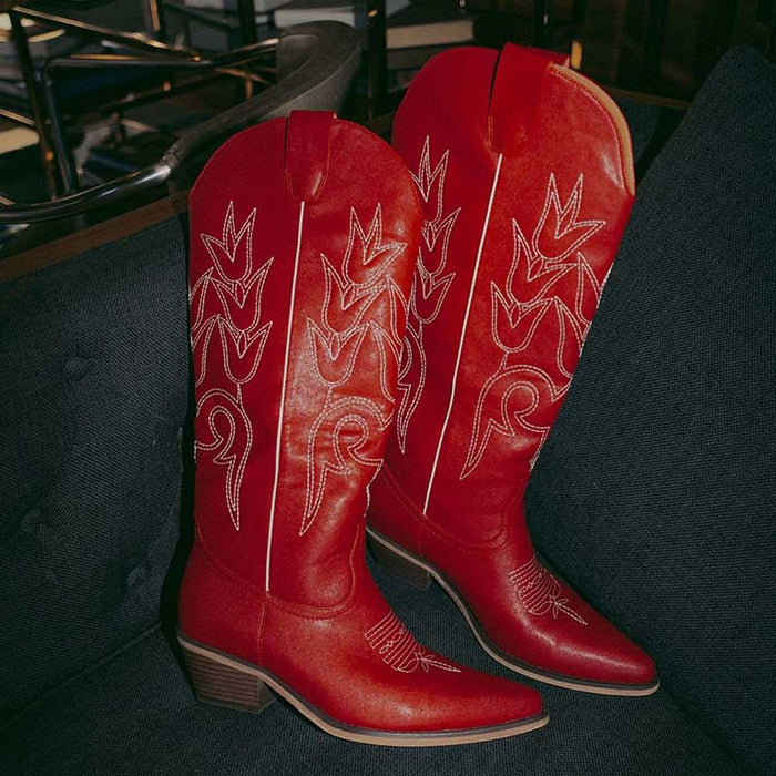 Stylish red chunky cowgirl boots for women with intricate stitching and pointed toe design