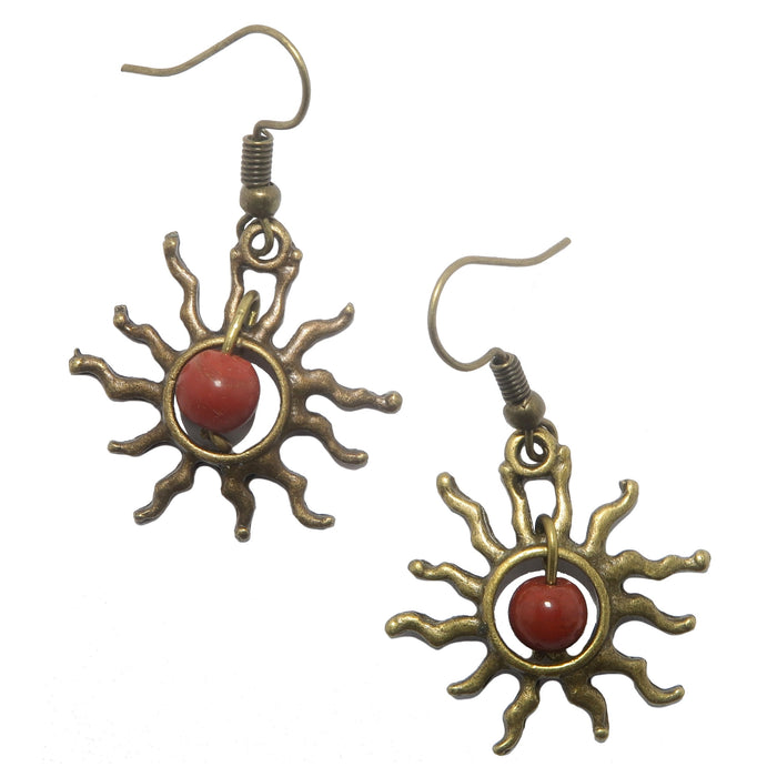 A pair of red jasper stone earrings with sun-shaped designs, made of brass-plated steel, displayed against a white background.