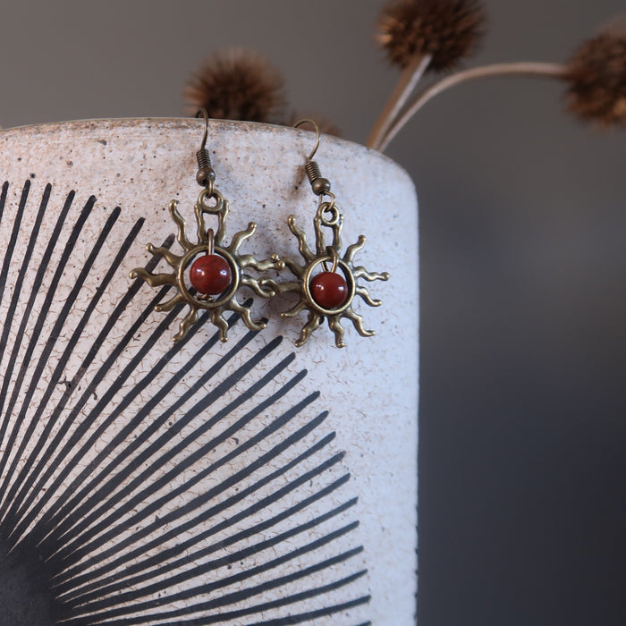 red jasper stone earrings with sun-shaped designs